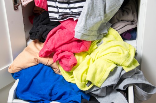 Electric low-carbon van arriving at a local transfer station